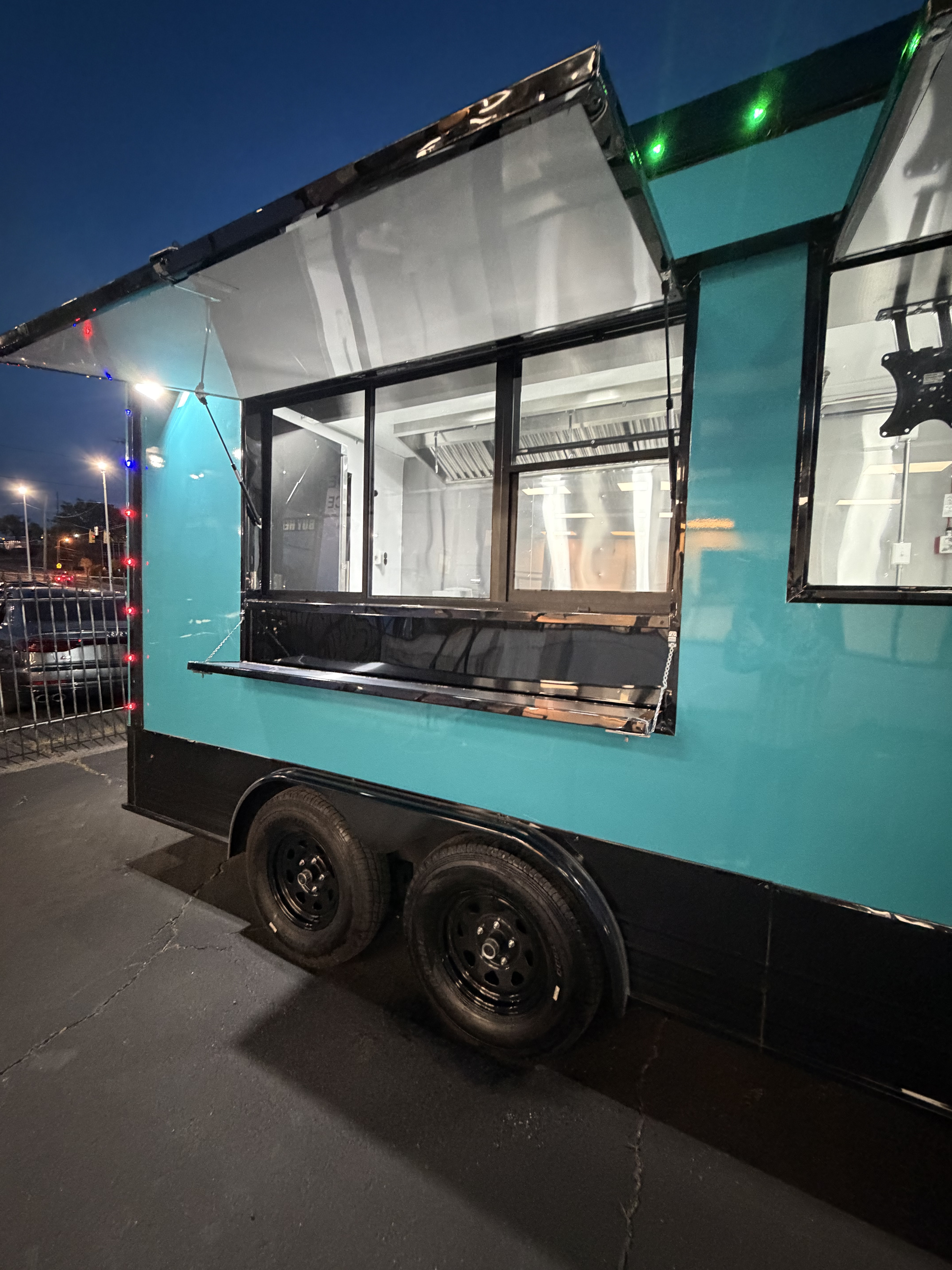 Turquoise trailer side view